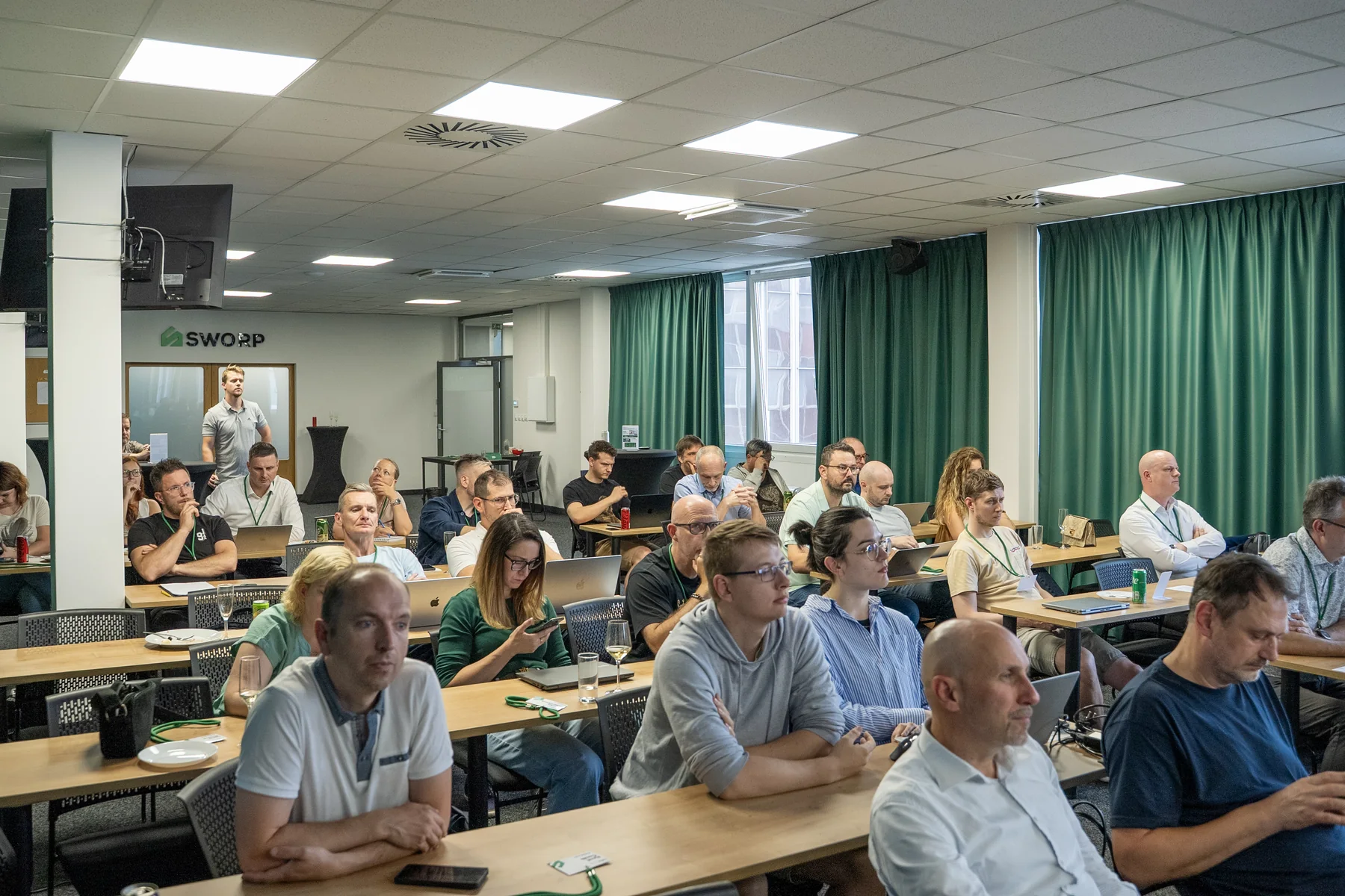Účastníci akce Praktické využití AI pro byznys a reality